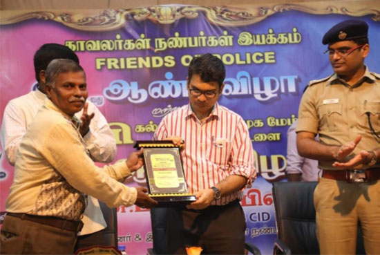 Surabi Foundation President/Founder Selvaraj is presented with the award by  Kumari District Collector Prasanth Vadanere